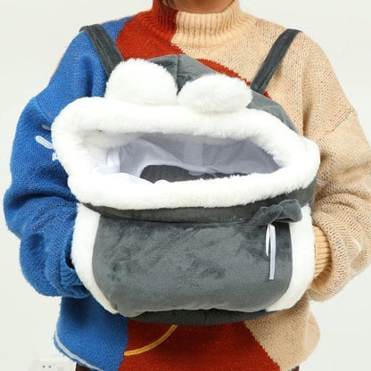 Sac de transport chien qui se porte a l'avant avec des poches 